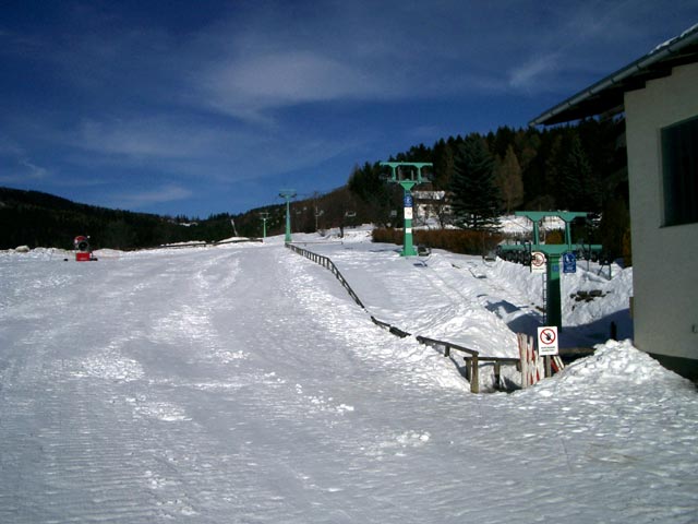 Talfahrt M&ouml;nichkirchen und Talstation des Sessellifts M&ouml;nichkirchen