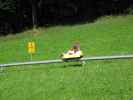 Papa auf der Sommerrodelbahn