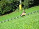 Papa auf der Sommerrodelbahn