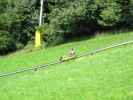 Mama auf der Sommerrodelbahn