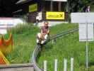 Papa auf der Sommerrodelbahn